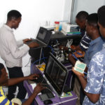 cvit nigeria training center and students working on a networking project