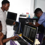 cvit nigeria training center and students working on a networking project